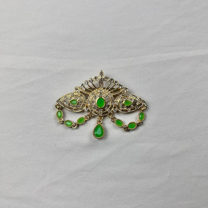 Broche marocaine dorée ornée de pierres vertes et strass pour caftan et tenue orientale